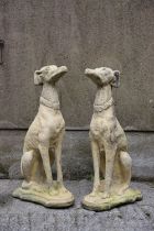 PAIR OF MOULDED STONE GARDEN SCULPTURES