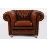 LEATHER UPHOLSTERED ROLL BACK ARMCHAIR