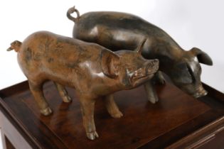 PAIR OF PIERRE CHENET BRONZE PIGS