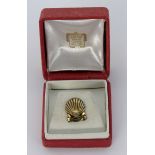 CARTIER PIN IN MUSCHELFORM. Silber