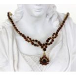 GRANAT-COLLIER 333/000 Gelbgold mit