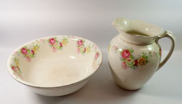 A Victorian toiletry bowl and jug printed roses