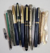 A box of fountain pens and pencils