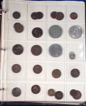 A coin album of British and world coins to include Charles II copper farthing, George IV and William