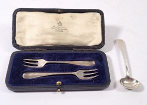 A pair of silver oyster forks, cased, London 1920 and a silver mustard spoon, London 1827