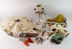 A group of vintage Kenner Star Wars play sets/vehicles including Millennium Falcon, CPG products