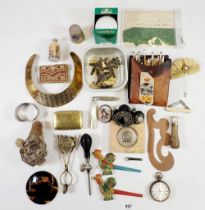 A box of collectables including wooden bobbins and brass snuff box