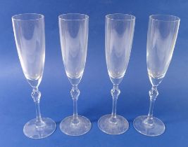 A set of four Schott tall champagne flutes