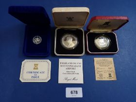 Three silver proof coins including 1985 Falkland Island opening of Mount Pleasant Airport fifty