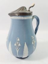 A 19th century stoneware and pewter mounted press moulded jug with lid decorated ferns and harebells