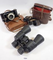 A Kodak Brownie camera, a Lieberman and Gortz pair of 8 x 25 binoculars and another pair of