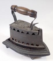 An Italian early 20th century box iron and Victorian trivet by Thomas Bradford & Co, trivet 25cm