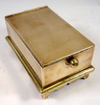 A 19th century brass tobacco box with sliding knob mechanism, 16 x 10 x 7.5cm