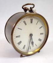 A brass cased drum clock, 10cm diameter