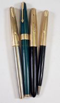 Two Parker fountain pens and a Parker pen/pencil and one other pen