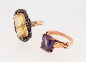 A gold ring set amethyst with Egyptian marks for 18ct, 1.8g, size M and a citrine and marcasite