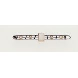 An Art Deco 9ct white gold brooch set pearls and opal, 4.5cm long
