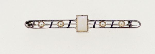 An Art Deco 9ct white gold brooch set pearls and opal, 4.5cm long