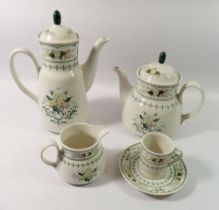 A Royal Doulton Provencal coffee set comprising ten cups, eleven saucers, two milk jugs, a lidded