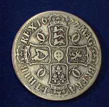 A Charles II silver crown 1677 Cond: Fair