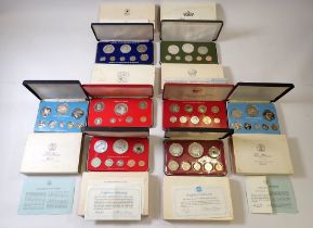 Eight Franklin Mint proof coin sets including Belize 1975 and 1976, Republic of Liberia 196,