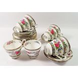 A Paragon Tree of Kashmir tea service comprising eight cups and saucers and eight tea plates