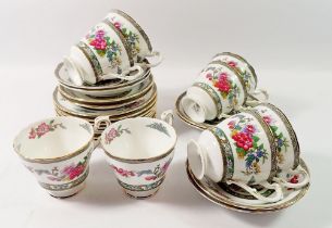 A Paragon Tree of Kashmir tea service comprising eight cups and saucers and eight tea plates