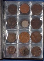 A coin album - combination of mainly copper bronze world coins, tokens and medallions 17th, 18th,