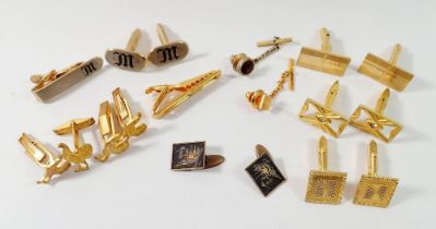 A pair of Omega gold plated cufflinks and tie pin plus various other cufflinks and tie pins