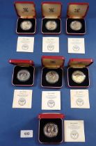 Seven Gambia silver 10 Dalasis coins 1975, each cased with COA, 28.28g per coin