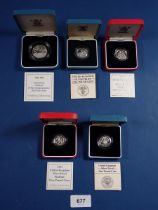 Five Royal Mint issue silver proof coins including 1985 and 1986 one pound coins, 1994 and 1997