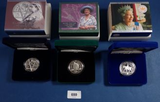Three Royal Mint silver crowns to include a 2000 piedfort Queen Mother centenary, 2001 Victoria