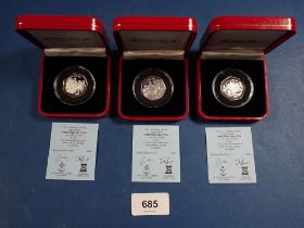 Three Pobjoy Mint Isle of Man silver proof Christmas fifty pences, 1997, 1998 and 1999, all cased