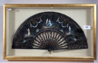 A continental hand painted fan with sequins mounted in glass frame