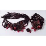 A Miriam Haskell vintage red glass bead necklace and bracelet with leaf and flower design