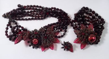 A Miriam Haskell vintage red glass bead necklace and bracelet with leaf and flower design