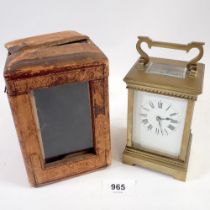 A 19th century French brass carriage clock with travelling case and key, 12.5cm