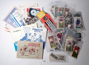 A group of vintage football cards and programmes