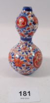 A Japanese double gourd form miniature vase, 10cm tall