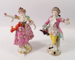 A pair of Sampson of Paris Chelsea style figures of a lady and gentleman, 19.5cm tall