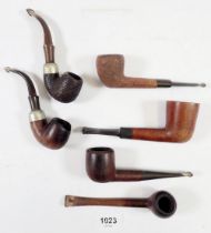 A box of six various pipes