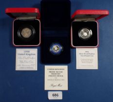 Three Royal Mint silver coins, 1982 piedfort twenty pence, 1994 piedfort two pound coin Tercentenary