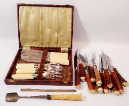 A set of six silver collared fish knives and forks cased together with a silver collared marrow