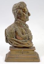 A brass bust of Wellington, 23cm