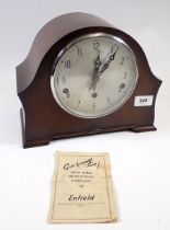 An Enfield Westminster chime oak mantel clock with original instructions, 27cm