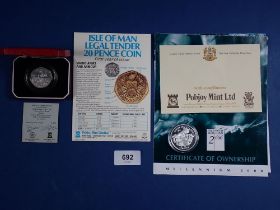 Three Pobjoy Mint Isle of Man silver proof coins including 1980 Christmas fifty pence cased, 1982