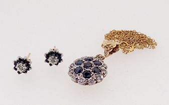 A 9 carat gold circular pendant set sapphires and diamonds and pair of similar earrings