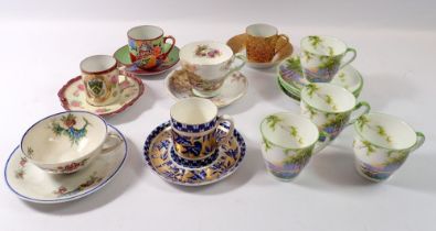 A collection of cups and saucers including Limoges, Shelley, Coalport and Aynsley etc.
