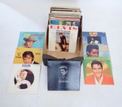 A collection of Elvis Presley vinyl LP records from 1960s - 1980s including Elvis TV Special, From