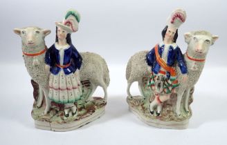 A pair of Victorian Staffordshire groups of sheep and children, one a/f